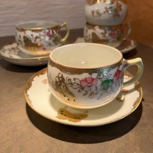 4 lovely cups and saucers